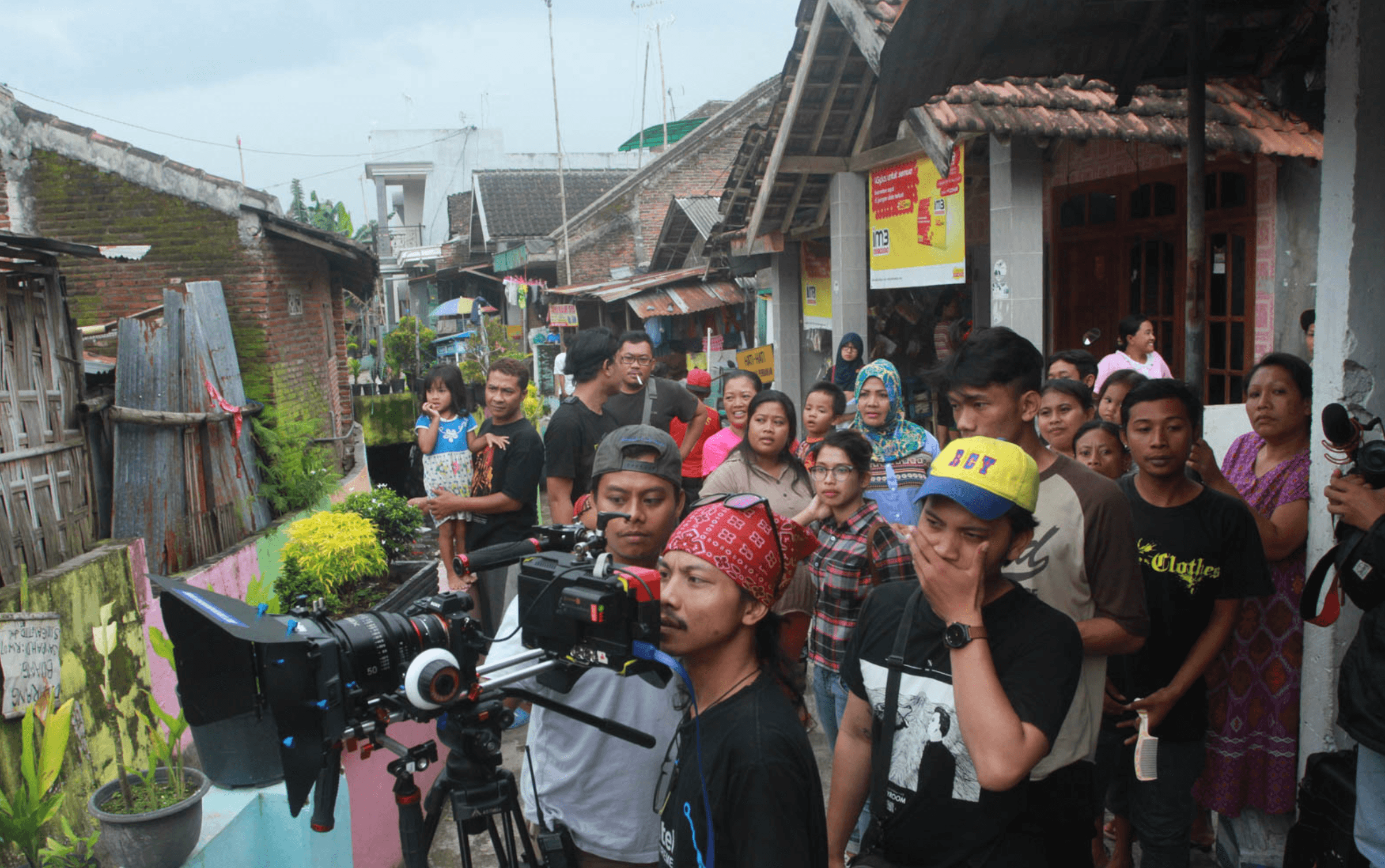 Community member holding flare