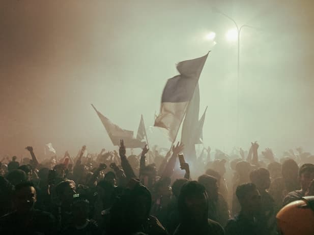 Community cheering crowd